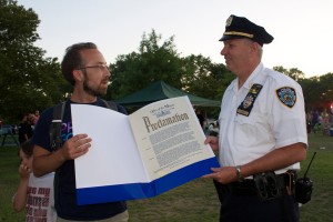 ​Lucas Pershing from Mayor Bill de Blasio's office and Captain Thomas Burke, Commanding Officer of the 63rd Precinct.
