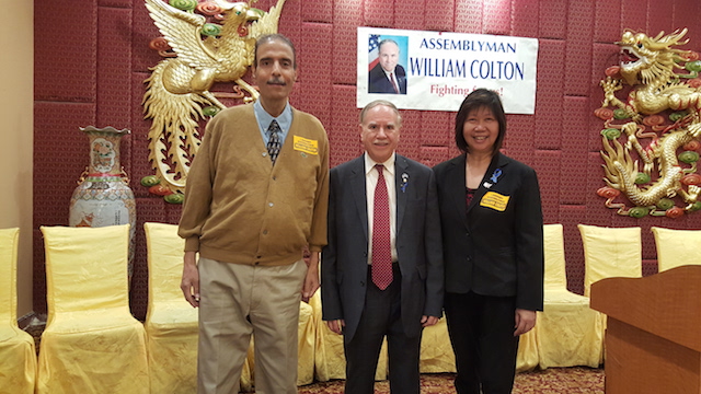 Assembly Member Bill Colton, center, with Democratic District Leaders Charles Ragusa, left, and Nancy Tong, right.