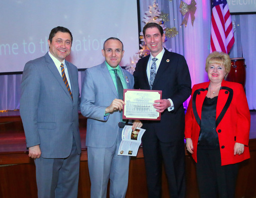 Council member Mark Treyger presents a certificate to his colleague Chaim Deutsch (1)