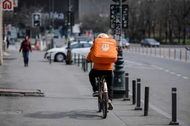 Takeaway delivery in downtown Bucharest during the covid-19 lockdown.