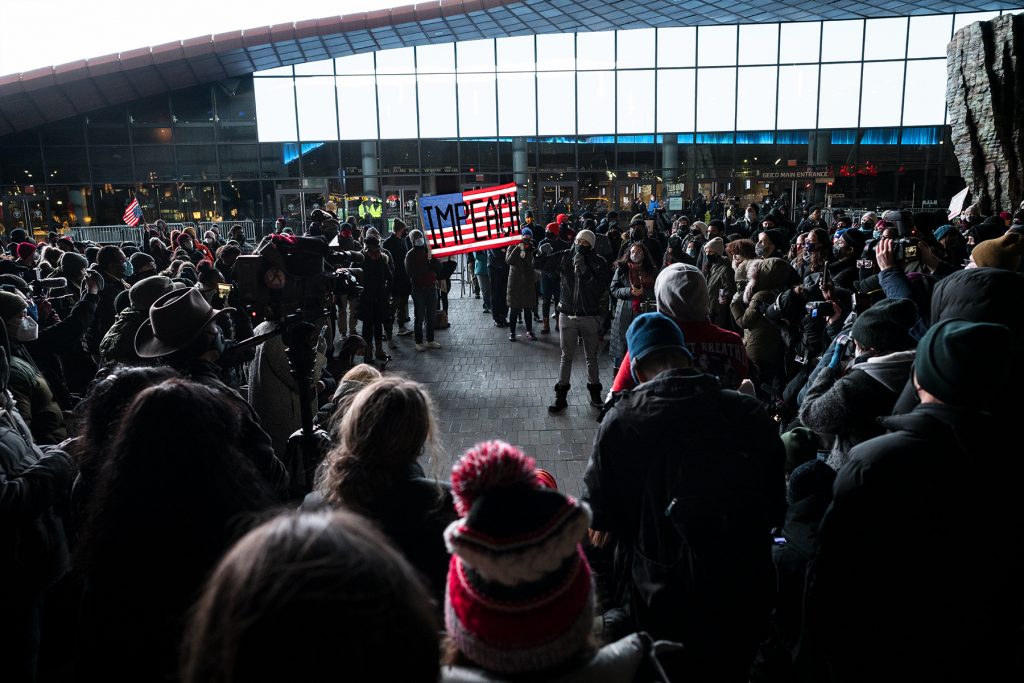 Public Advocate Jumaane Williams surrounded by a gathered crowed at Barclay center