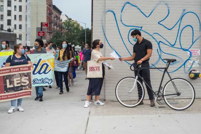 Marielle Martiney (Center), Senior Impact Manager of Good Old Lower East Side, a neighborhood housing and preservation organization at the march