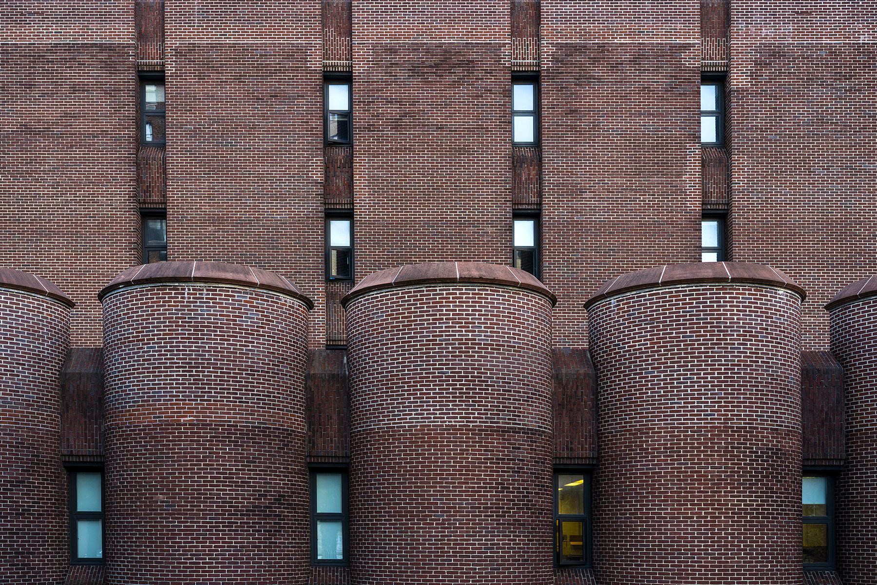 Small windows on “The Brick Prison,” on East 94th Street (Photo by New York County Politics)