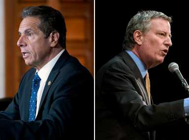 L-R: NYS Governor Andrew Cuomo (Photo credit: Mike Groll/Office of Governor Andrew M. Cuomo) and NYC Mayor Bill de Blasio (Photo credit: Michael Appleton/Mayoral Photography)