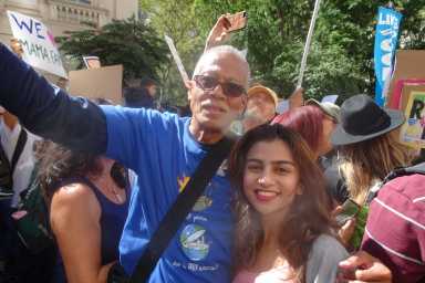 Senator Robert Jackson stands with Legislative Aide Sowaibah Shahbaz (Photo by William Engel)