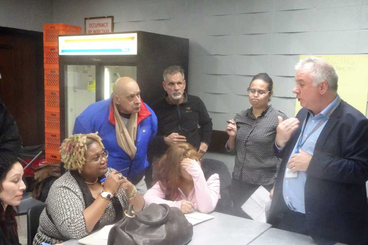 NYCHA Official Brian Honan speaks directly to NYCHA tenants (photo by William Engel)