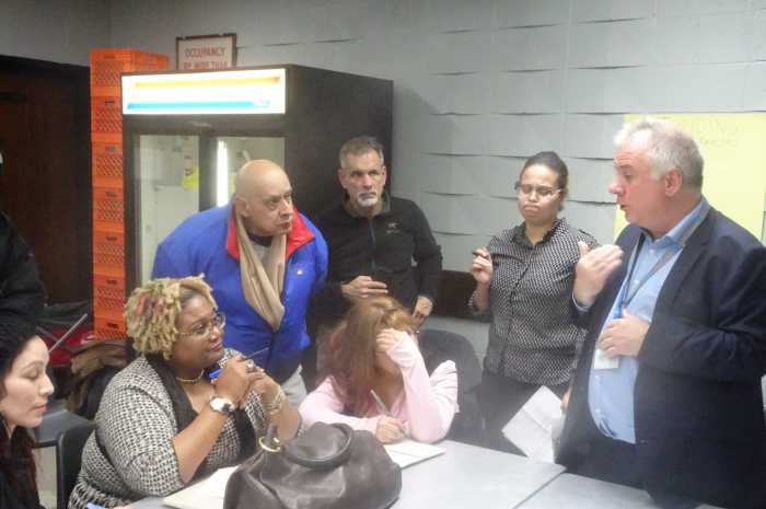 NYCHA Official Brian Honan speaks directly to NYCHA tenants (photo by William Engel)