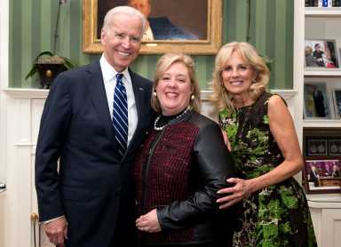 Rebecca Seawright smiling for the camera with Joe and Jill Biden