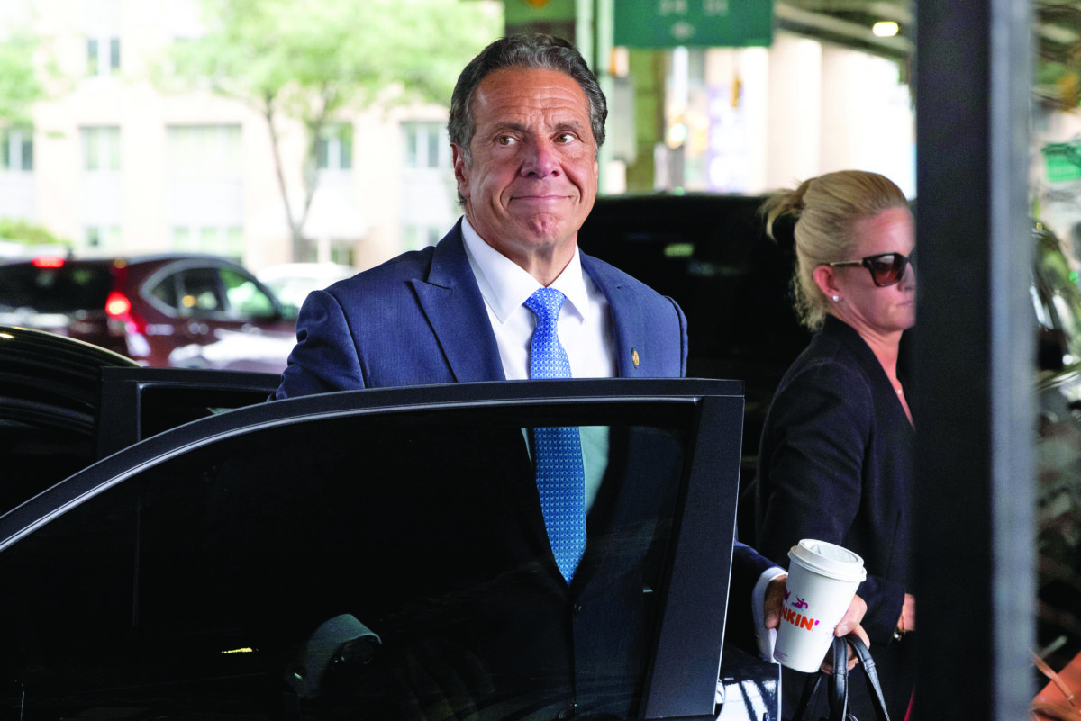 New York Governor Andrew Cuomo arrives to depart in his helicopter after announcing his resignation in Manhattan, New York City