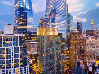 Aerial panorama of New York City skyscrapers at dusk